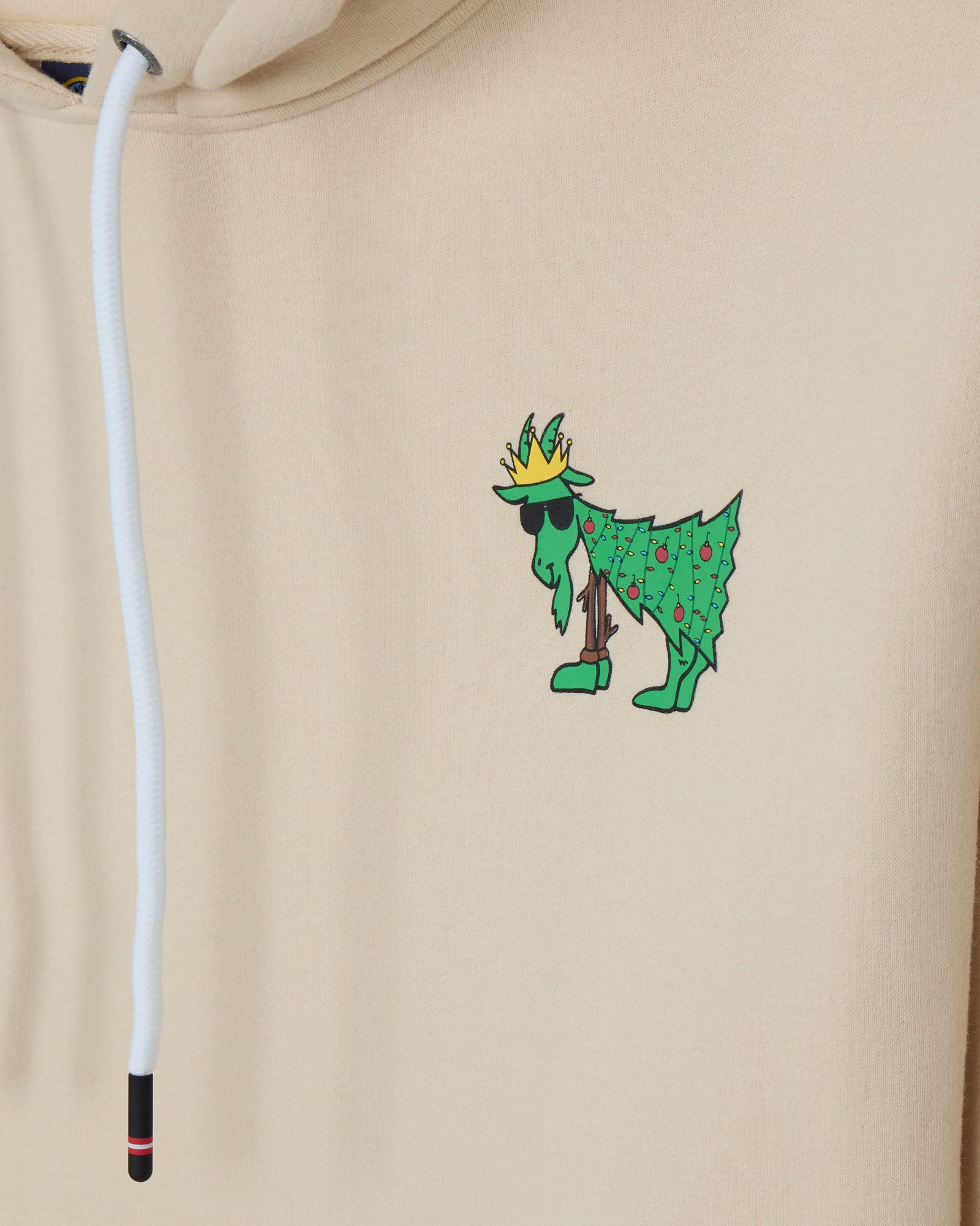 Beige hoodie with a green character wearing a crown on a beige background