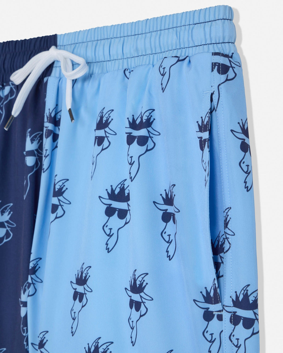 Blue swim shorts with graphic design on a white background