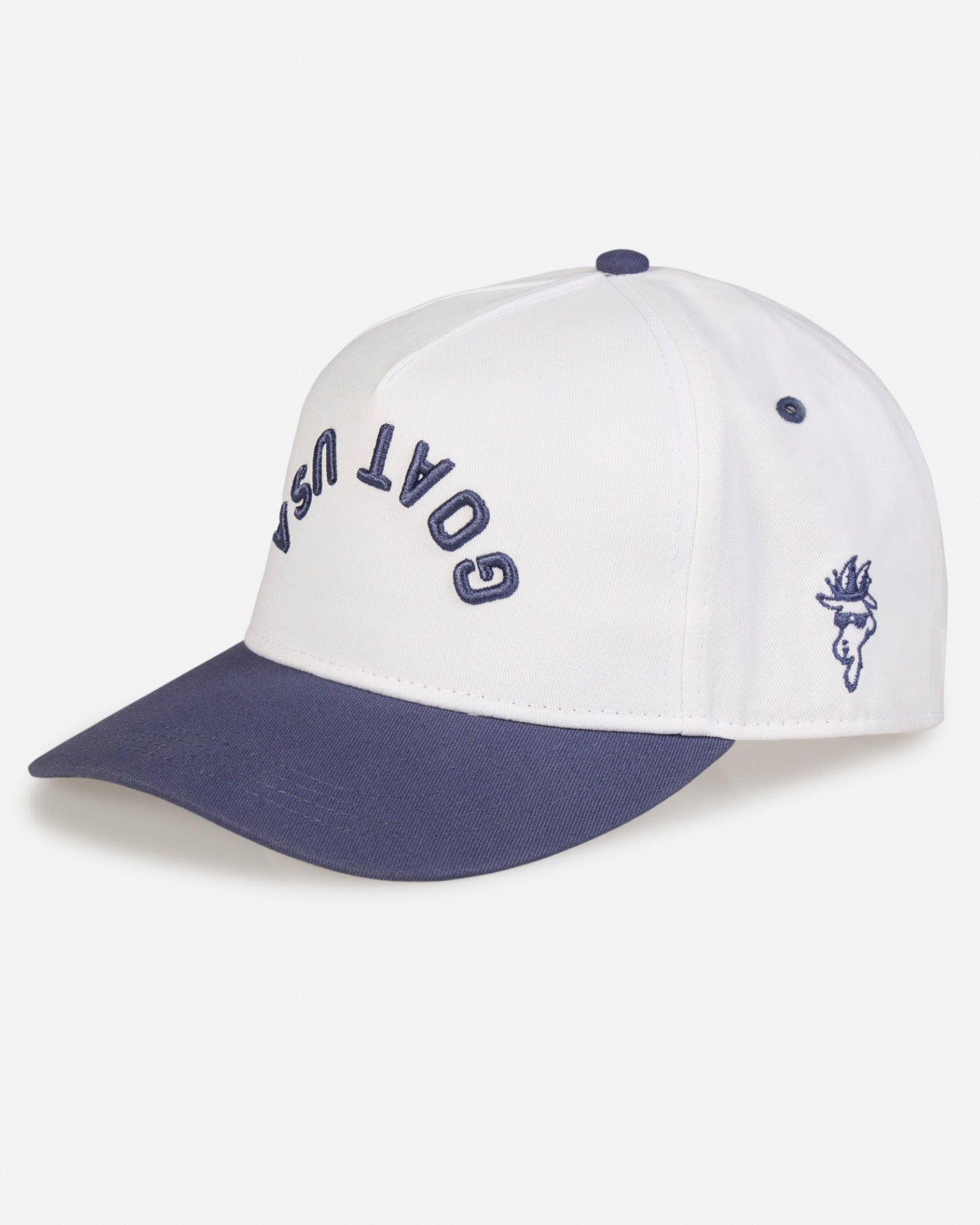 Angled-view of white and navy hat with "GOAT USA" written upside down