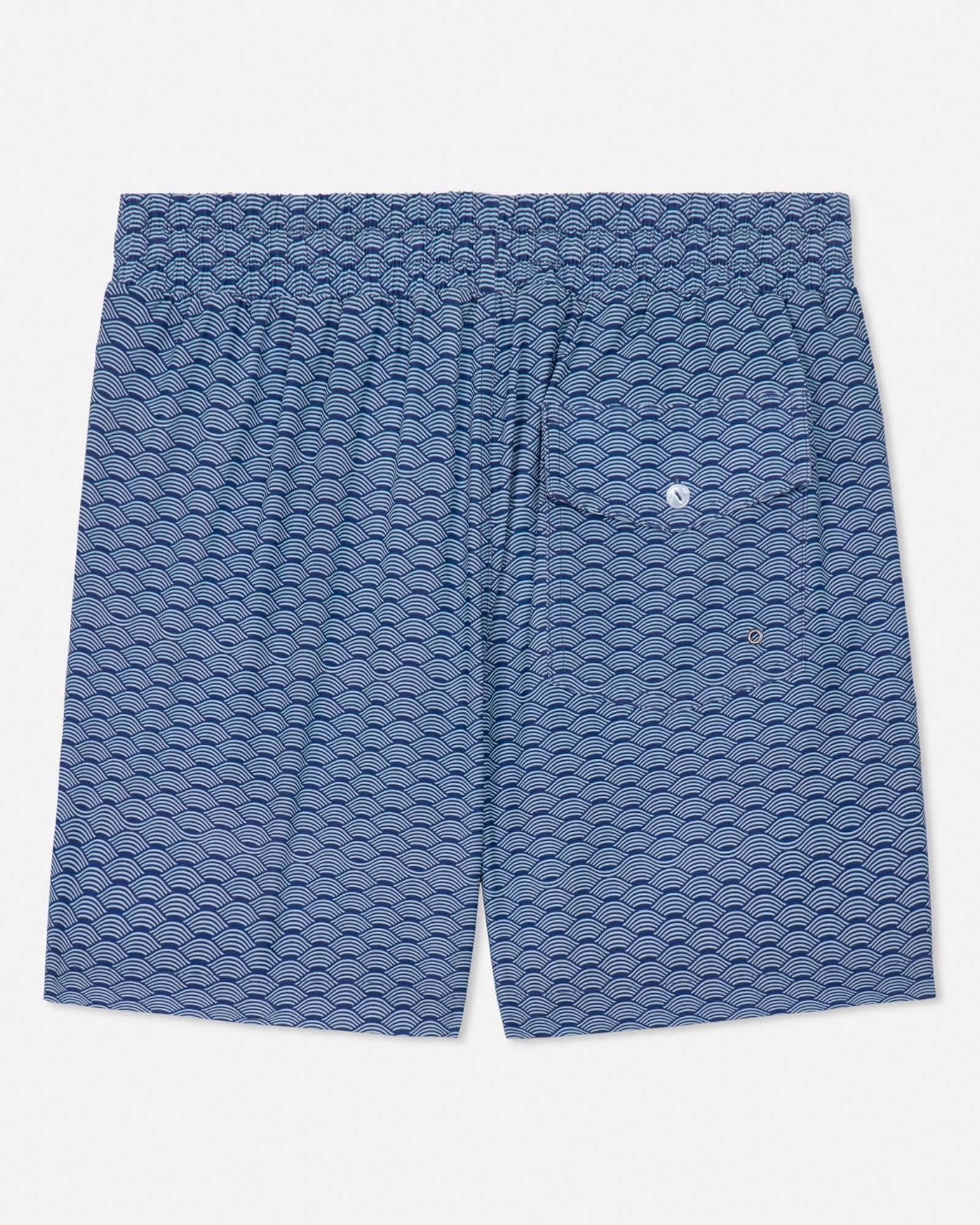 Blue patterned shorts on a white background