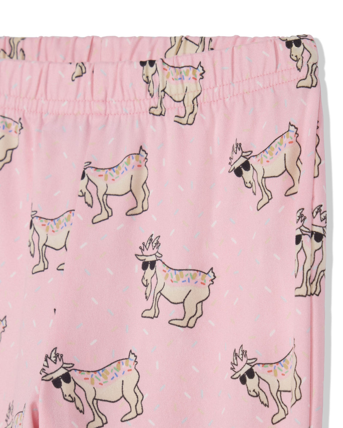 Pink children's pj pants featuring an all-over print of cartoon goat figures wearing sunglasses and colorful rainbow sprinkles, with a matching elastic waistband