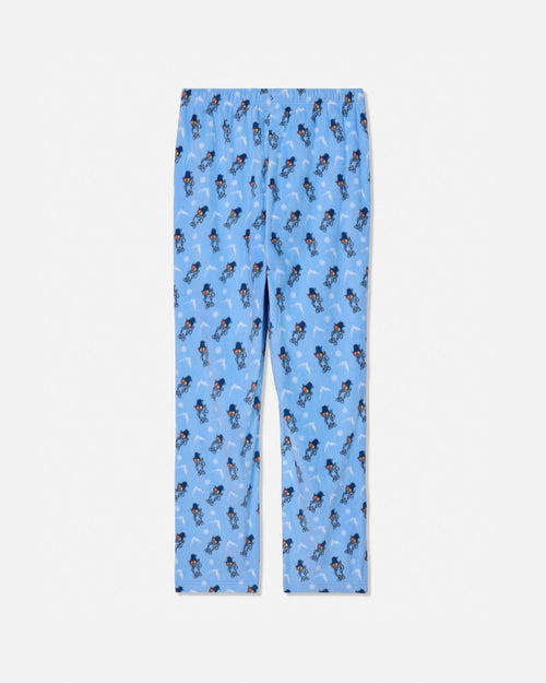 Light blue pajama pants with an all-over repeating print of cartoon characters in dark blue and white, shown flat against a light gray background.