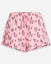 Front of pink shorts with cherries and cherry goats print