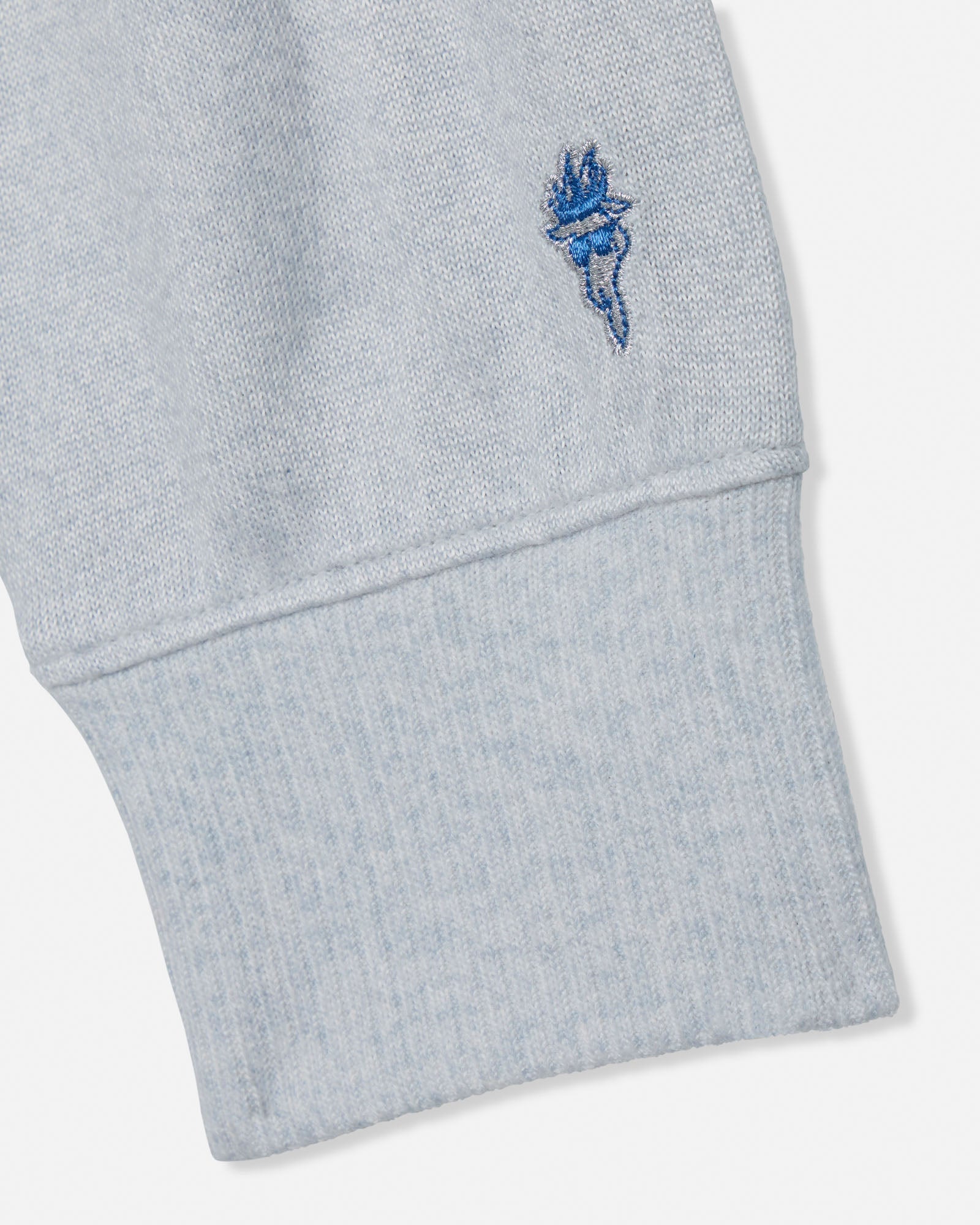 Gray sweatshirt with a blue embroidered design on a light gray background