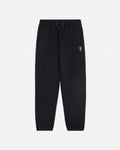 Black sweatpants with a small white logo on a light gray background