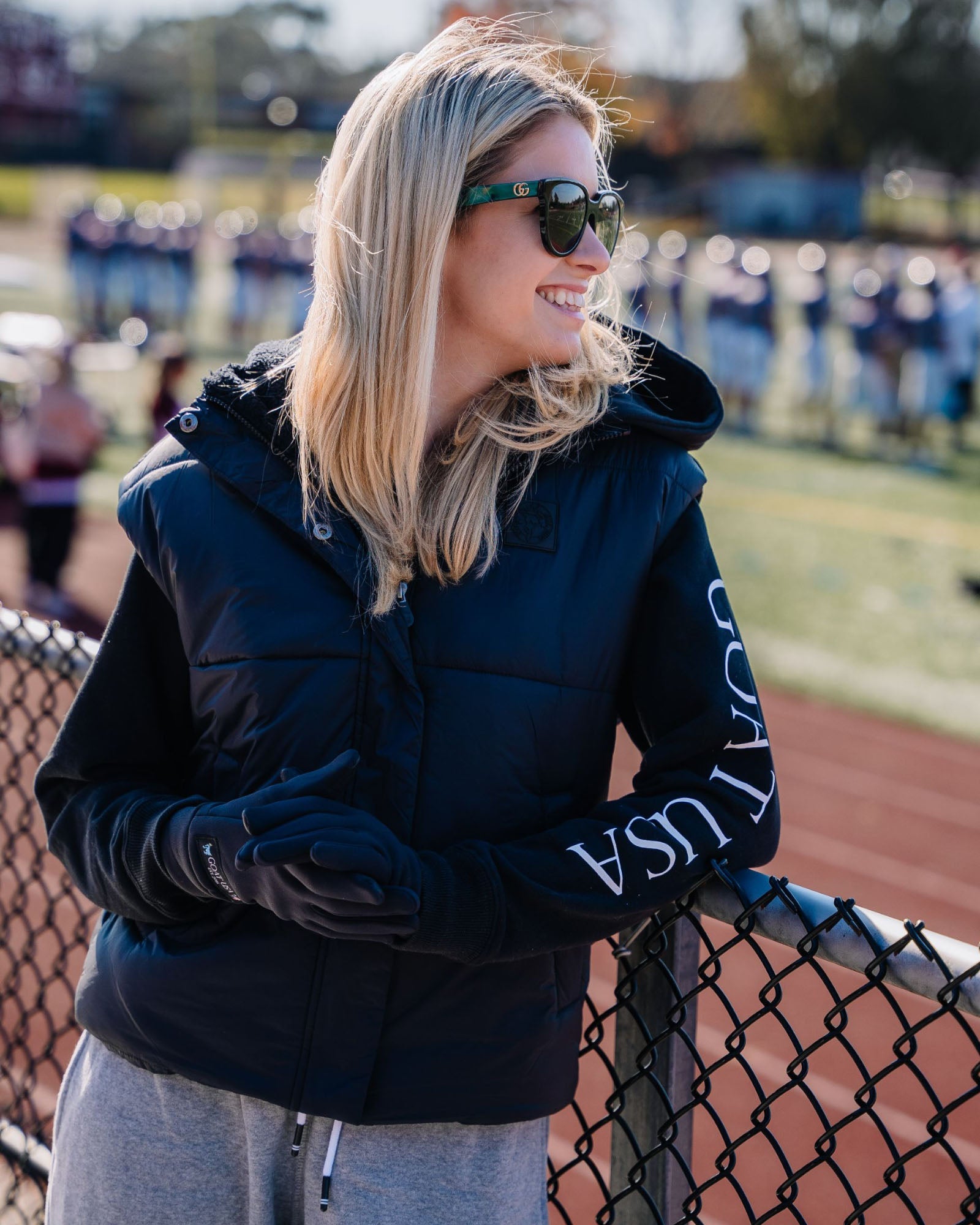 Model wearing black Women's Puffer Fleece Vest#color_black