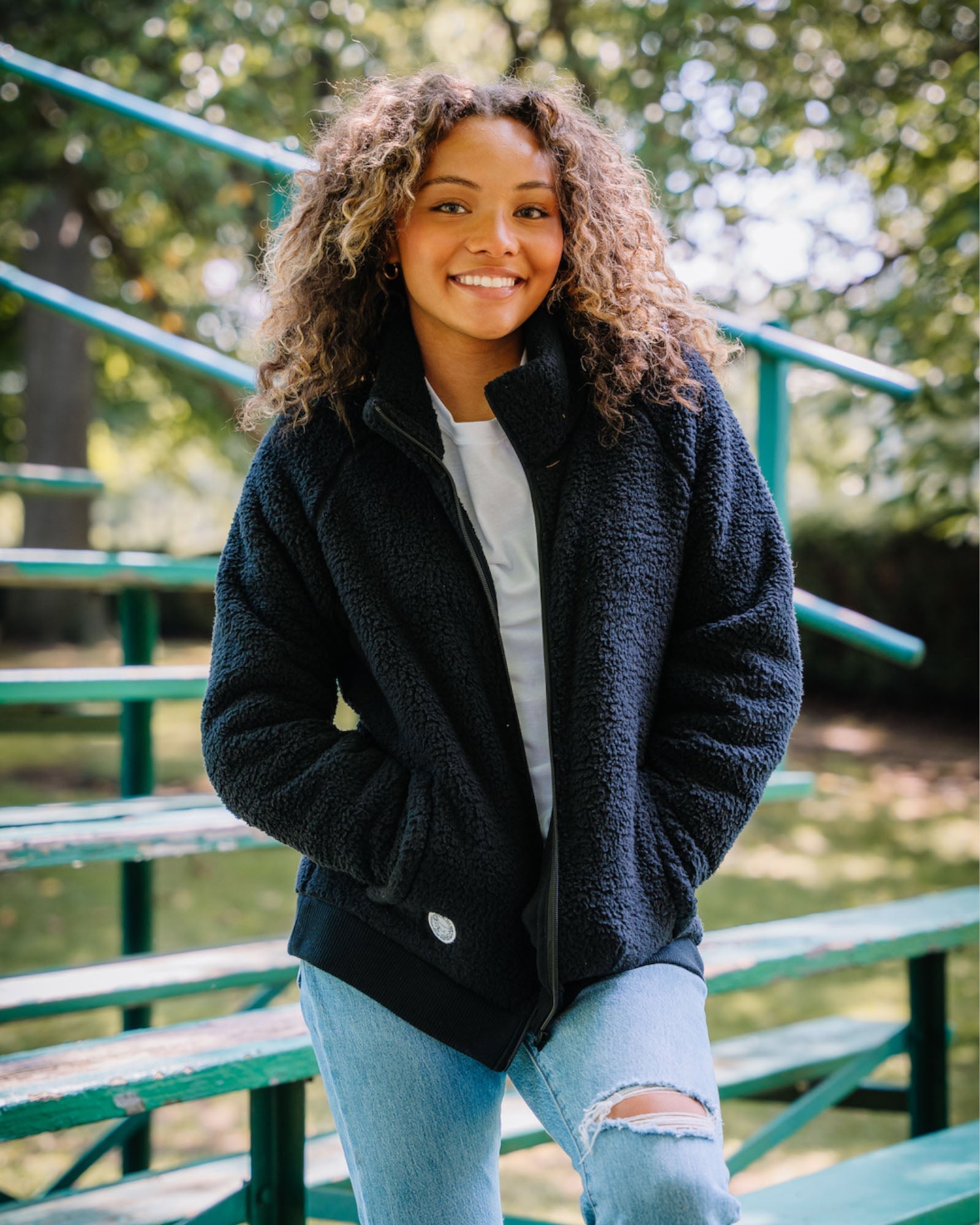 Model wearing black Women's Sherpa Full Zip Jacket#color_black
