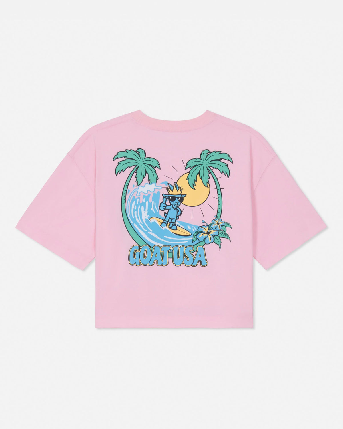 Pink t-shirt with a graphic of a goat surfing a wave, palm trees, and 'COAT USA' text on a white background.