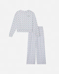 Gray women's pajama set with holiday tree pattern
