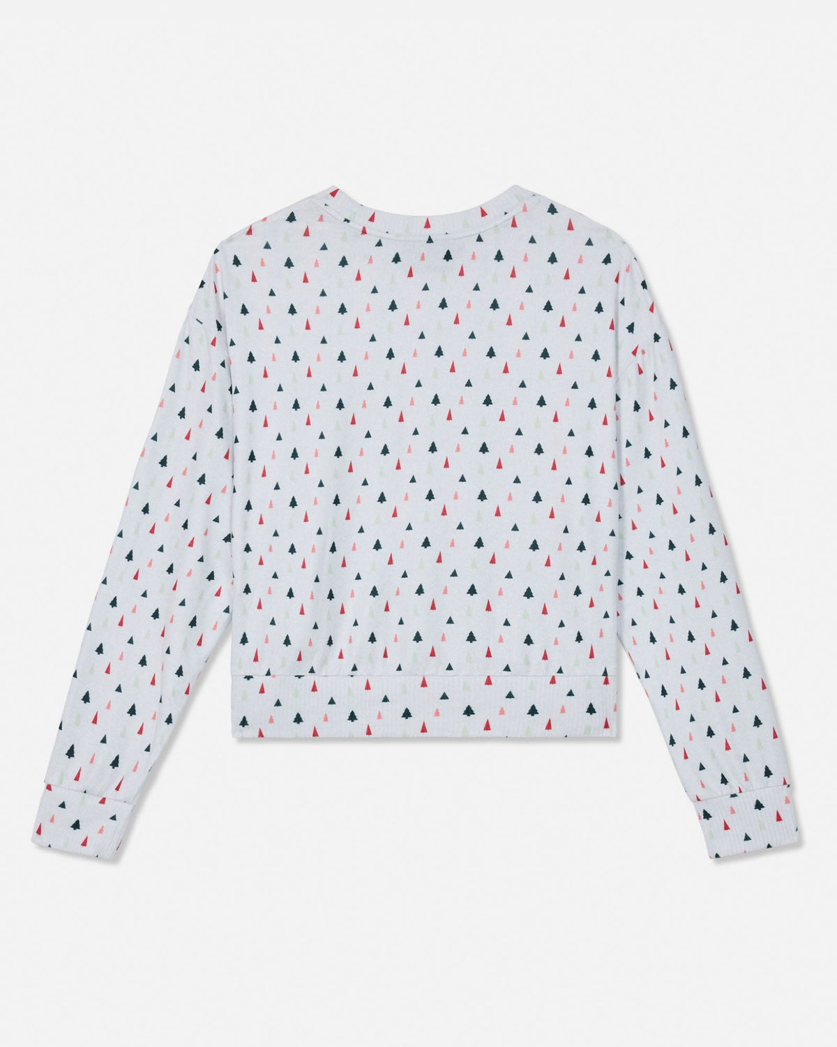 A long-sleeve cropped sweatshirt with a white base and an all-over repeating pattern of small red and dark green tree silhouettes, shown flat against a light gray background.