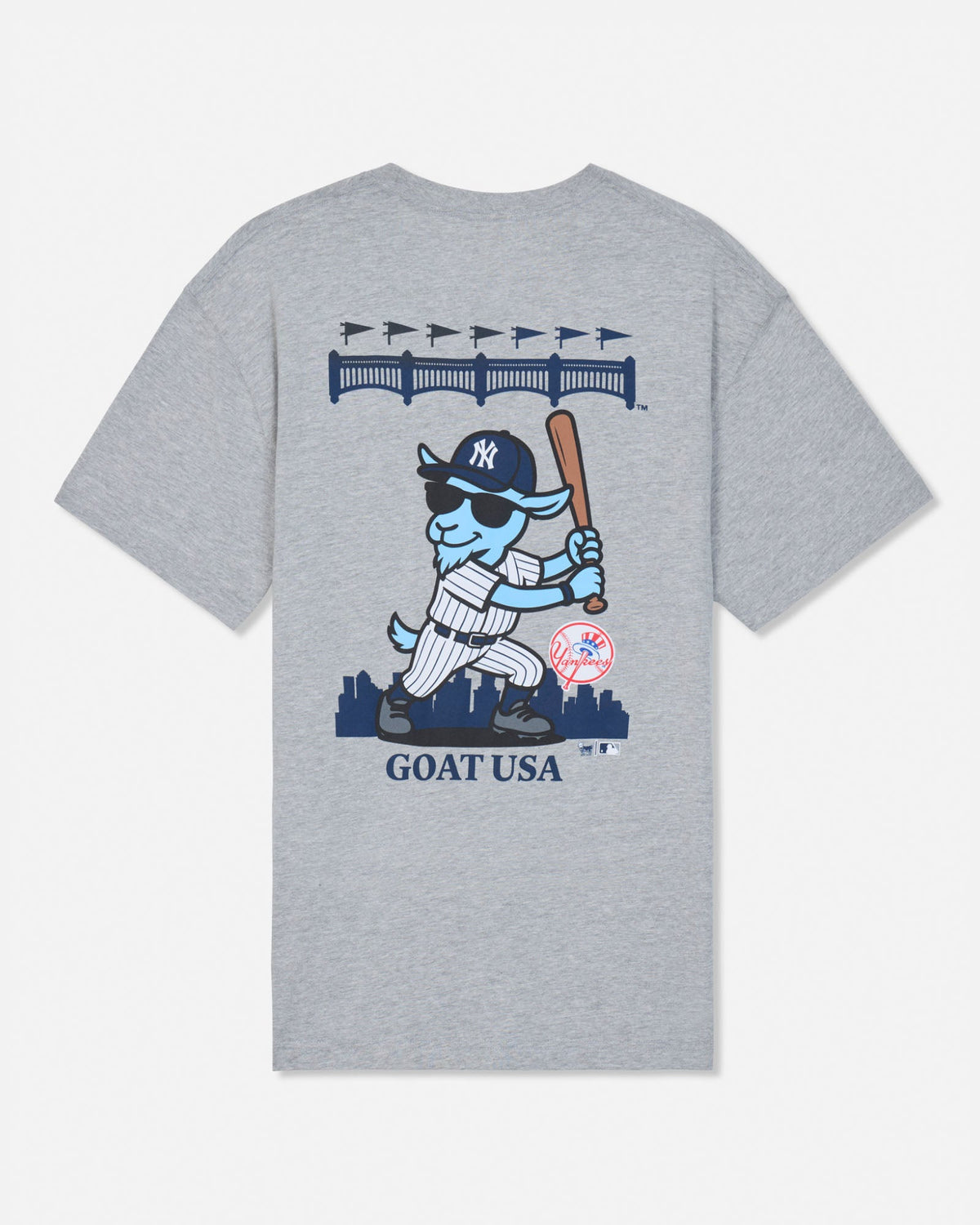 A heather gray short-sleeve t-shirt with a large graphic on the front featuring a cartoon blue goat in a New York Yankees uniform holding a bat, with 'GOAT USA' printed below.#color_gray