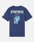 A navy blue short-sleeve t-shirt shown from the back, featuring a large graphic of a light blue cartoon goat wearing a New York Yankees cap and holding a bat, with a white bridge graphic above.